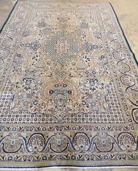 A Qum carpet, 319 x 212cm